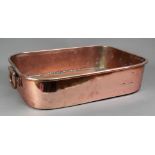 A Victorian rectangular deep copper roasting pan, with drop side handles, 56 x 40.5 x 12.5cm.