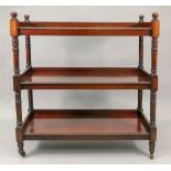 A Victorian mahogany three tier buffet,