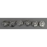 A set of six Art Nouveau silver buttons,