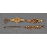 A Victorian 15ct gold bar brooch, of sha