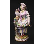 A Meissen figure of a young lady, 19th c