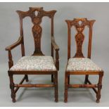 A set of twelve reproduction carved oak