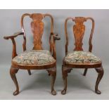 A reproduction early 18th century style figured burr walnut veneered and crossbanded dining room