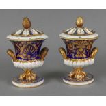 A pair of Derby campana shape pot pourri vases and covers, early 19th century,
