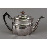 A George III shaped oval silver teapot,