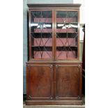 A George III style mahogany bookcase, la