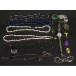 A collection of silver and bead jeweller