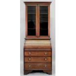 An Edwardian mahogany satinwood crossbanded boxwood and ebony strung cylinder front bureau bookcase,