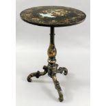 A Victorian black lacquer and mother of pearl inset pedestal table, with circular tilt-top,