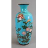 A cloisonne enamel baluster vase Meiji period, with flowering chrysanthemums on a turquoise ground,