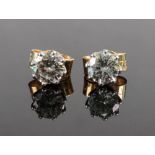 A pair of 18ct gold single-stone diamond earstuds,