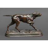 After Alfred Dubucand (1828-1894) A Pointer, standing on a naturalistic base, patinated bronze,