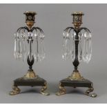 A pair of Regency style bronze gilt meta