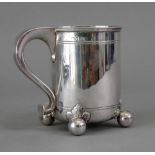 A Victorian cylindrical silver mug, probably George Fox, London 1869, in late 17th century style,