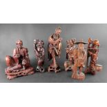 A group of six Chinese carved wood figur