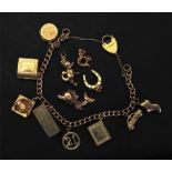 A 9ct gold curb-link charm bracelet, sus