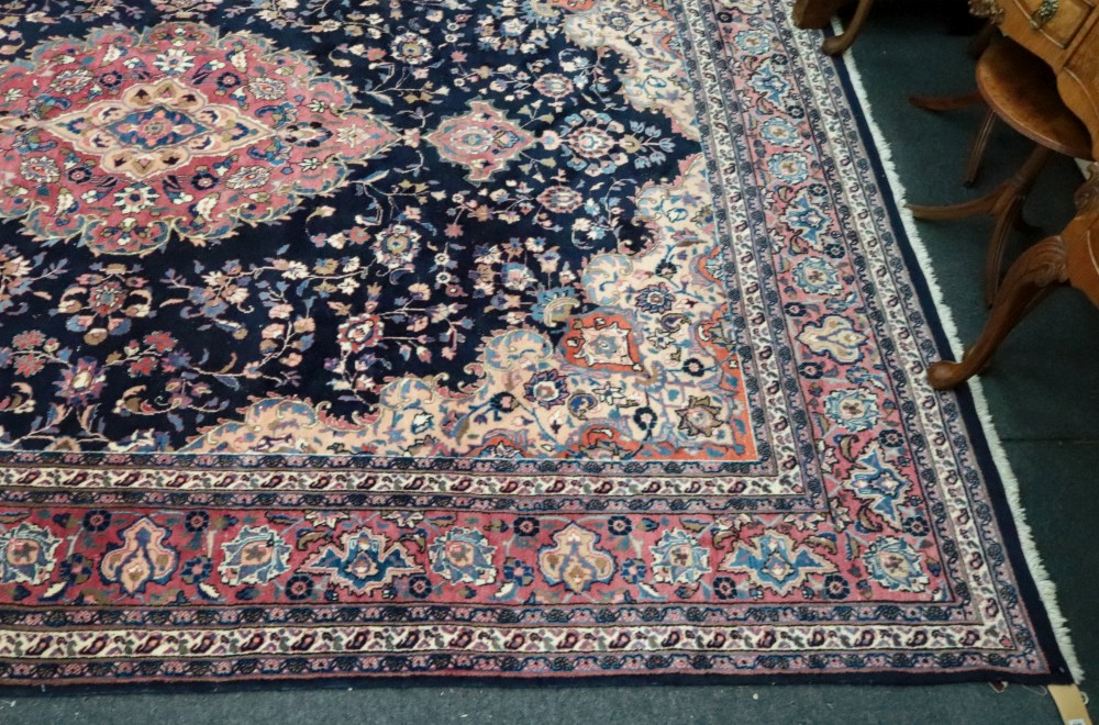 A modern Iranian carpet, with a central lozenge, surrounded by flowering branches, - Image 2 of 3