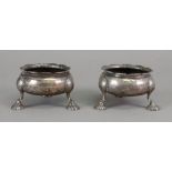 A pair of George II silver cauldron salt cellars, David Hennell, London 1747, with gadroon rims,