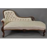 A Victorian foliate carved rosewood frame chaise longue, button down upholstered,