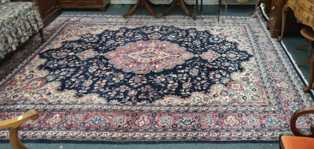 A modern Iranian carpet, with a central lozenge, surrounded by flowering branches, - Image 3 of 3