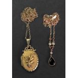 A 9ct gold garnet and seed pearl-set pendant necklace set with alternating seed pearl and