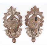 A pair of 19th century gilt/silvered wooden wall sconces,