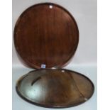 Two 19th century dished mahogany circular serving trays, 50cm diameter. (a.f.