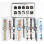 A Swatch display showing ten stages of the assembly of a Swatch wristwatch,