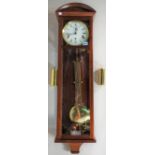 A modern mahogany Vienna style wall clock with mahogany case,