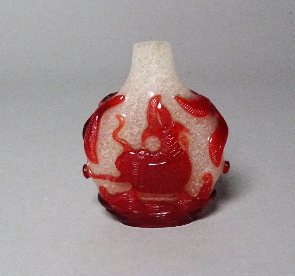 A Chinese red overlay glass snuff bottle, 19th century,