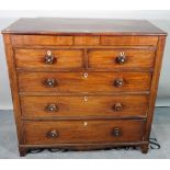 A George III mahogany chest, with two flush drawers over two short and three long graduated drawers,