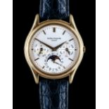 A Patek Philippe gold circular cased gentleman's calendar wristwatch,