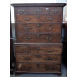 An 18th century mahogany chest on chest of three short over six long graduated drawers divided by