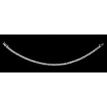 An 18ct white gold and diamond line bracelet, claw set with a row of fifty circular cut diamonds,