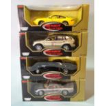'MOTOR MAX PREMIUM COLLECTION', a group of four boxed models of vehicles.