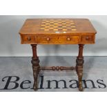 A Victorian inlaid walnut games table, with three frieze drawers on downswept supports,