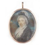 Gold framed Georgian miniature of an old lady in a bonnet, signed bottom left and date 1797,
