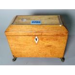 A Regency inlaid mahogany rectangular tea caddy with metal claw feet, 19cm wide x 16cm high.