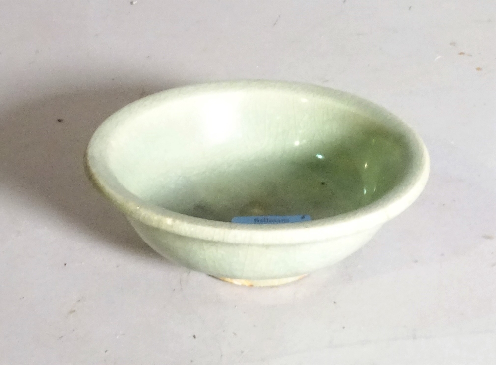 A small Chinese Lonquan celadon glazed bowl, Ming dynasty, 16th/17th century, shallow form,