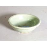 A small Chinese Lonquan celadon glazed bowl, Ming dynasty, 16th/17th century, shallow form,