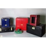 A group of various boxes, including three leather vertu cases, a leather clock case,