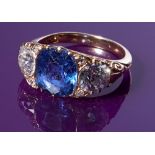 A gold, Ceylon sapphire and diamond ring,