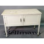 A late Edwardian white painted marble topped washstand, on tapering square supports,