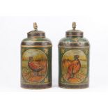 A pair of tole peinte lamps, early 20th century, detailed with pheasants against a green ground,