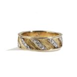 A gold and diamond set band ring,
