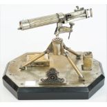 A silver plated brass model of a WWI Vickers machine gun, 20th century,