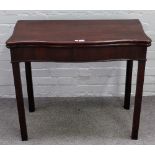 A mid-18th century mahogany serpentine card table, on square supports, 86cm wide x 75cm high.