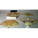 A group of four fans, 19th century, ivory and lace, cased. (a.f.).