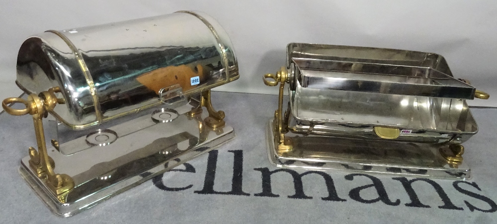 A pair of silver plated food warmers, 20th century, of domed form on a brass frame,