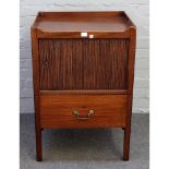 A George III mahogany tray top night stand, with tambour panel over pull-out on block supports,